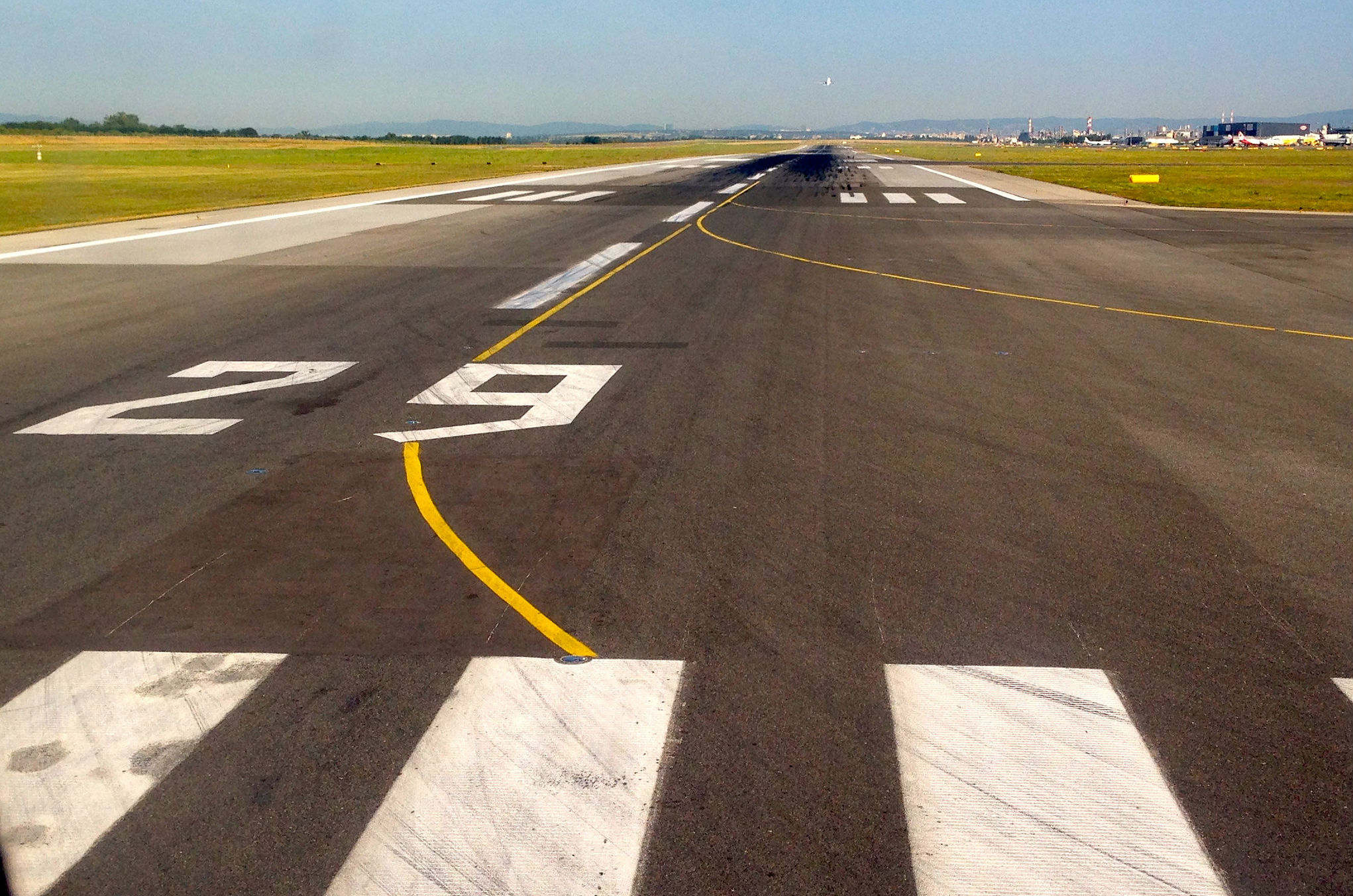 Looking down an airport runway.